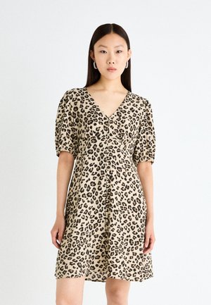 Leopard print dress made of lightweight fabric, featuring short puff sleeves, a V-neckline, and a flared silhouette.