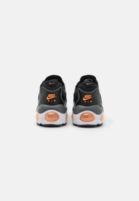 Nike Sportswear NIKE AIR MAX TW NN - Tenisice - black/total orange/smoke grey/white