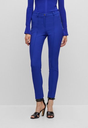 Spodnie materiałowe