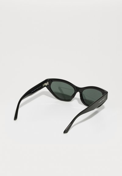 Black cat-eye sunglasses with dark green lenses, glossy finish, and curved arms featuring subtle logo detail on the temple.