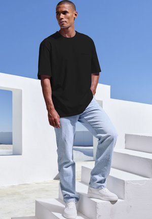 Basic T-shirt - schwarz