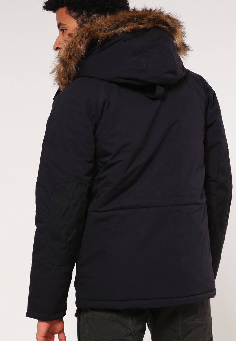 Carhartt WIP TRAPPER Vinterkappa rock black Zalando.se Carhartt WIP TRAPPER Vinterjacka dark firblack Zalando.se