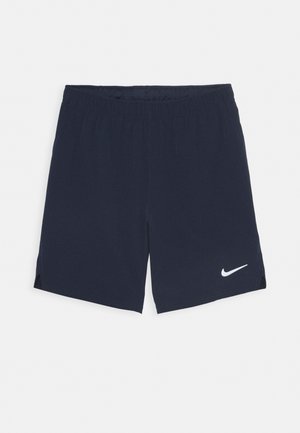 Pantalones cortos azul marino hechos de una tela ligera con una cinturilla elástica, respiraderos laterales y un logotipo de Nike en blanco en la parte inferior izquierda.