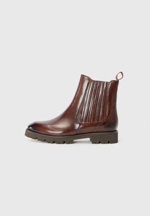 Bottine en cuir marron avec un côté élastique côtelé, un bout pointu, un panneau arrière texturé et une languette sur le talon.