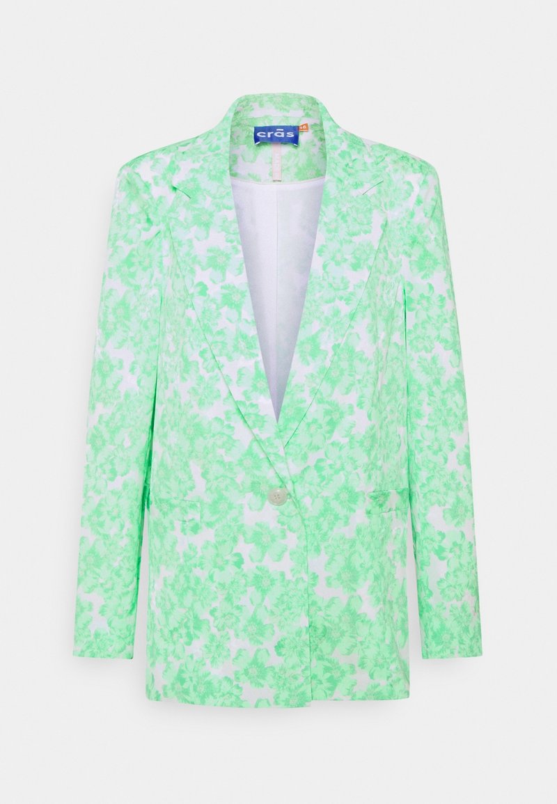 Blazer blanc avec un seul bouton, imprimé floral vert, revers crantés, manches longues et coupe slim suspendu sur un fond uni.