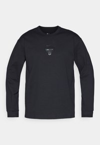 Sort langærmet Nike-shirt med rund halsudskæring og et glinsende sort oksegraphic centreret på brystet. Blødt bomuldsblandingsmateriale.