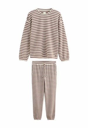 Juostuotas laisvalaikio rinkinys iš minkštos medžiagos, su ilgomis rankovėmis ir tamprių tipo kelnėmis su apvadu. Spalvos apima kremą ir švelnią rudą.