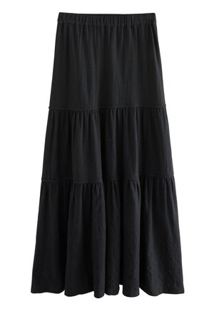 Falda negra en capas hecha de tela texturizada. Presenta una cintura elástica y capas fruncidas que crean una silueta fluida.