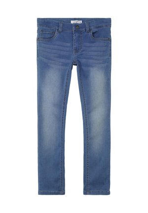 Blå slim-fit jeans med falmede lårområder, knap foran, lynlås, bæltestropper og fem lommer, lagt fladt på en hvid baggrund.