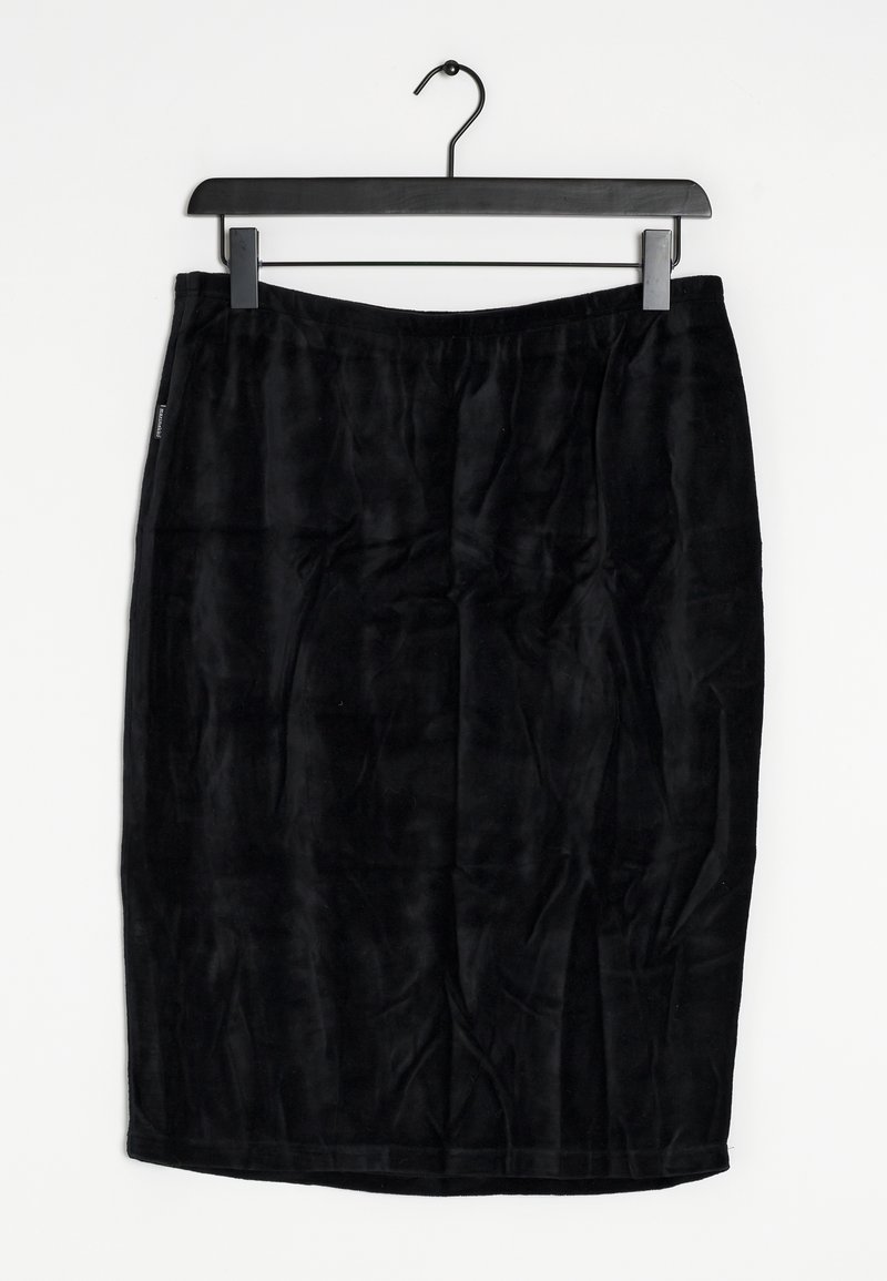 Black velvet pencil skirt with a smooth texture, elastic waistband, and a straight silhouette, hanging on a black clip hanger.