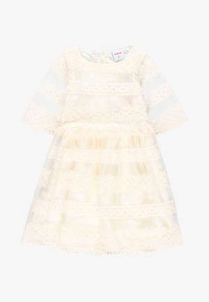 Robe bébé couleur crème avec détails en dentelle, manches mi-longues, col rond et jupe à volants superposés.