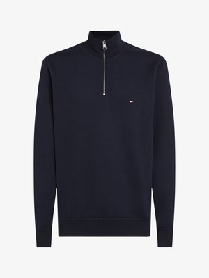 Navy-Fleece-Pullover mit halb Öffnung aus weichem Stoff mit glatter Textur; hat ein kleines Logo auf der Brust sowie gerippte Bündchen und Saum.