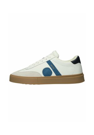 White low-top sneaker with beige suede toe, blue side stripe and circle, black heel tab, and brown rubber sole.