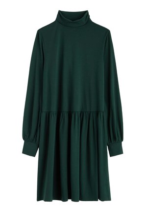 Tamnozelena haljina dugih rukava s visokim ovratnikom, naboranim strukom i lepršavom suknjom. Izrađena je od glatkog, rastezljivog materijala.