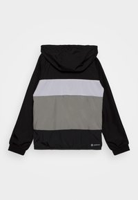 Black hooded jacket with color-blocked design featuring grey and light purple horizontal stripes. Smooth, lightweight fabric with elastic cuffs.