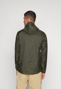 Patagonia HOUDINI  - Vindjakke - pine needle green