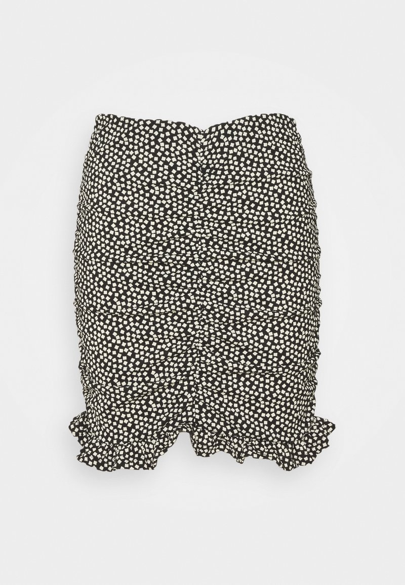 Jupe noire à motif tacheté blanc, avec un ourlet à volants et une surface texturée. Conçue avec des détails froncés sur les côtés.