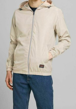 Mezisezónní bunda  - beige