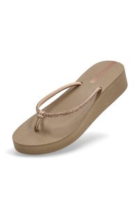 Chanclas de plataforma color beige claro con una planta texturizada, tira delgada adornada con pequeños cristales translúcidos y un tacón ligero.