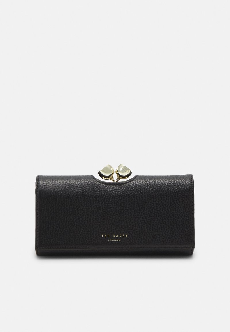 Portefeuille en cuir noir texturé avec un fermoir doré en forme de deux cœurs et un petit logo doré Ted Baker London à l'avant.