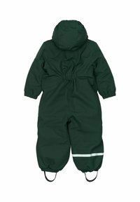 Combinezon impermeabil verde cu glugă, mansete elastice și bretele pentru gleznă. Are o dungi reflectorizante albe pe picioare. Textură netedă.