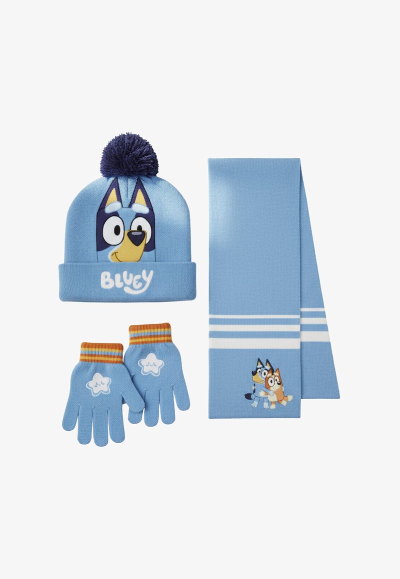 Set invernale per bambini con berretto blu decorato con il volto di un cane e pompon, guanti abbinati con stelle e sciarpa blu con due cani dei cartoni.