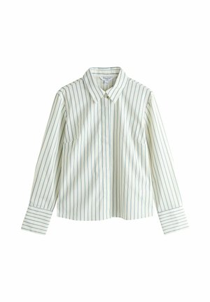 Koszula w paski z długim rękawem w jasnokremowym kolorze z niebieskimi pionowymi paskami, z klasycznym kołnierzykiem i dwoma przednimi kieszeniami. Gładka struktura tkaniny.