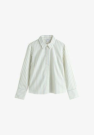 Langærmet skjorte med striber i lys creme med blå lodrette striber, med klassisk krave og to forlommer. Glat stoftekstur.