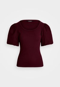 Burgundy puffärmad topp i ribbat tyg, med rundad halsringning och figursydd siluett. Slät textur med subtil glans.