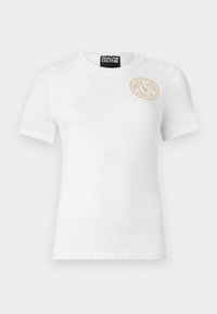 Kijelölve, white/gold-coloured