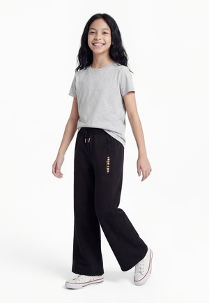 Calvin Klein Jeans GLITTER WIDE LEG PANT - Treningo apatinė dalis - black