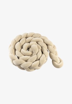 Beige braided cushion made of soft fabric, coiled in a spiral shape. The texture appears plush with rounded ends and a smooth surface.