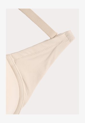 Beiger BH aus weichem Stoff, mit geformten Cups und verstellbaren Trägern. Verfügt über glatte Nähte und ein nahtloses Design für ein sauberes Aussehen.