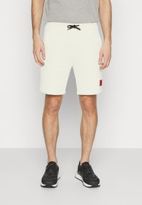 HUGO DIZ - Calças de fato de treino - natural