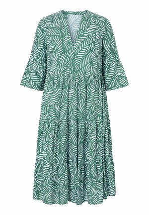 Zielona sukienka midi w biały tropikalny wzór liści, z dekoltem w serek, rozkloszowanymi rękawami do łokcia i falbanami na spódnicy.