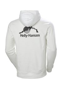 Sudadera blanca con capucha que presenta un gráfico de montaña negra y un sol en la parte posterior, con el texto "Helly-Hansen" debajo. Textura de algodón suave.