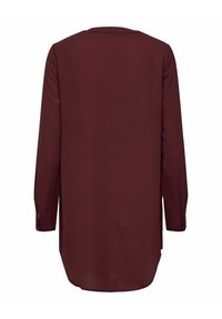 Tunique manches longues couleur bordeaux foncé avec un ourlet arrondi et des poignets boutonnés, vue de dos sur un fond blanc.