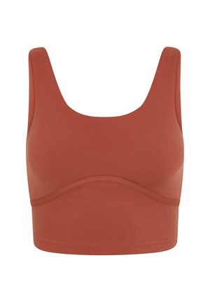 Rūsganas sporta krūšturis ar izgriezumu, platām siksnām un gludu tekstūru. Iespējo bezšuvju dizainu un vidēja garuma segumu.