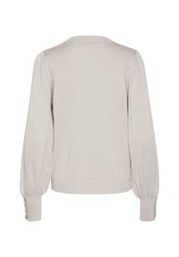 Cardigan beige clair avec un col rond, des manches longues bouffantes et des poignets côtelés. Présente une texture lisse et des détails de boutons aux manches.