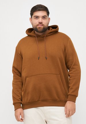 Bruine hoodie van zacht materiaal, met een voorzak, een trekkoord en ribgebreide manchetten en zoom.