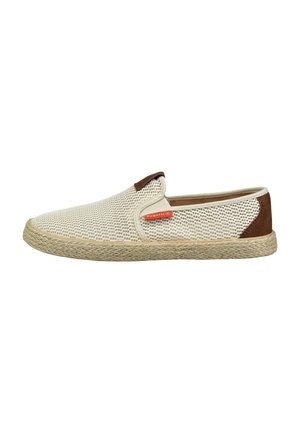 Beiger Slipper mit Mesh-Obermaterial, braunen Akzenten und Jutesohle, mit strukturiertem Obermaterial und kleinem roten Logodetail an der Seite.