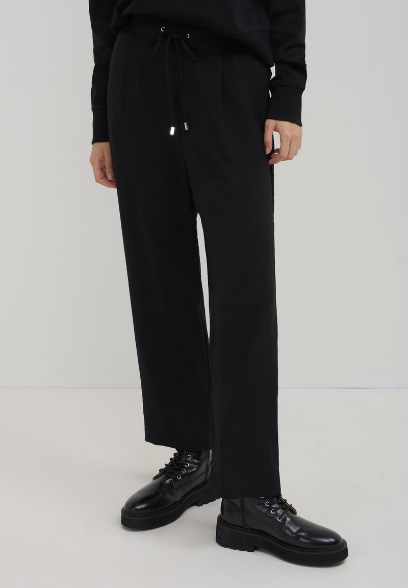 Calliope JOGGER  - Pantalon de survêtement - nero