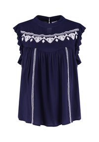 Blusa senza maniche blu navy con motivi geometrici ricamati bianchi sul petto e bordi verticali, con dettagli a volant sulle spalle.