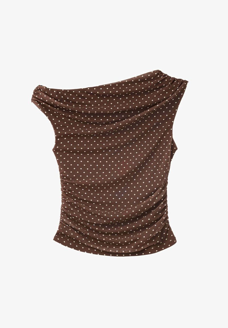 Haut marron sans manches à pois blancs, côtés froncés et encolure asymétrique décolletée.