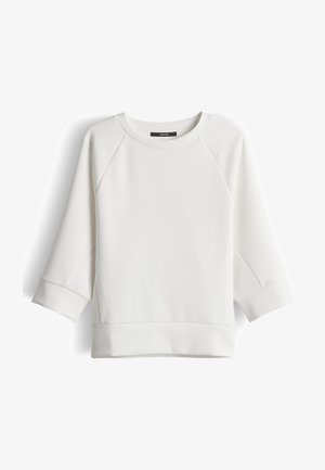Witte sweatshirt met lange mouwen, ronde hals, raglanmouwen en brede manchetten en zoom, weergegeven op een witte achtergrond.