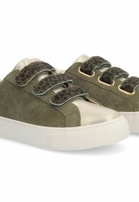Olive green suede sneakers with metallic gold toe cap, textured leopard print straps, and white rubber soles; three adjustable Velcro closures.