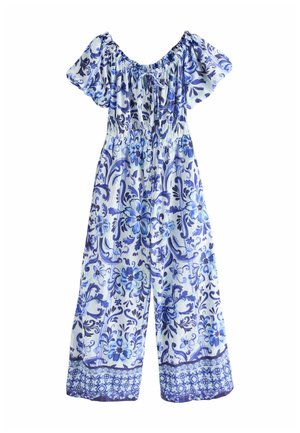 Blue and white floral-patterned jumpsuit with short puff sleeves, elasticized waist, and wide-leg design, featuring intricate detailing.