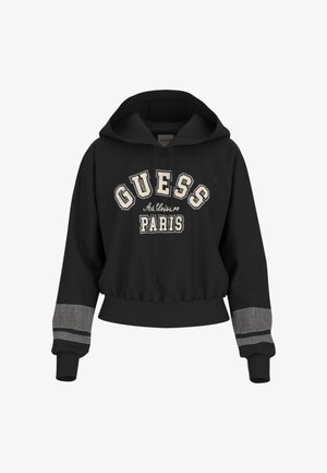 Sweat à capuche noir avec "GUESS PARIS" en blanc, orné d'accents en strass et de poignets texturés. Design court avec ourlet élastique.