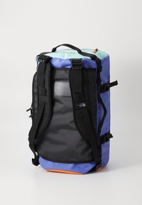 The North Face BASE CAMP DUFFEL S UNISEX - Holdall - indigo plum/bright foam papaya