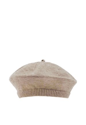 Soft beige knitted beret with ribbed band and small top loop, isolated on white background.